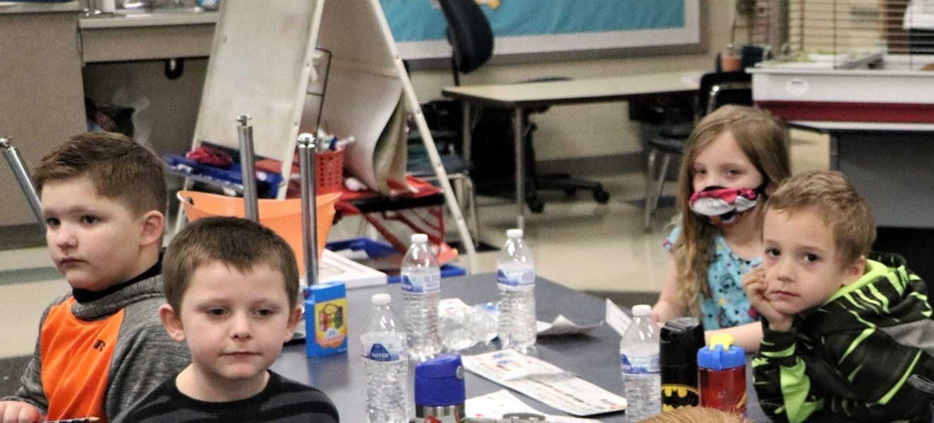 students sitting at a table